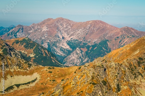 Mountain landscape with lake in the valley. Photo taken in Szpiglasowy Wierch  Peak in Polish Tatra Mountains. photo