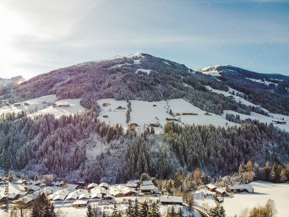 Aerial view town, Tirol. Austria by drone. Alps mountains. Winter.