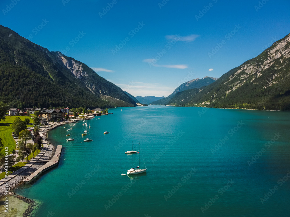 Obraz premium Aerial view Achensee sea in Maurach, Tirol. Austria by drone. Alps mountains.