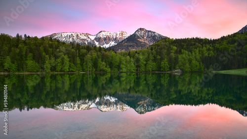 Spring Serenity: Majestic Mountain Reflections in Alatsee Lake, Bavaria