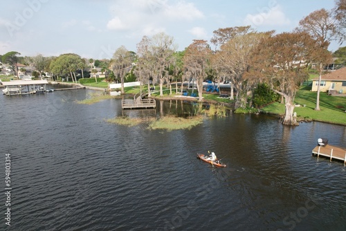 A drone photograph of Lake Tarpon in Tarpon Springs, Florida, of a community park in a natural setting.