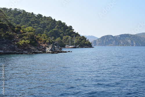 view of the bay of the island in Marmaris, Türkiye. tourist ship. deserted island