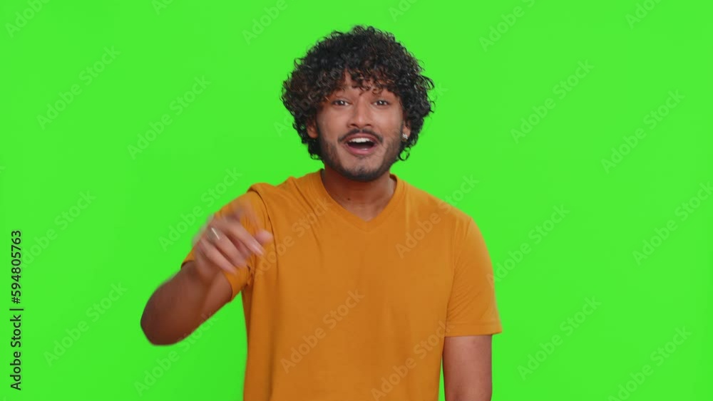 Countdown to holiday birthday celebration. Young indian man counting in reverse order from five to one. Handsome hindu guy celebrating success, winning lottery jackpot goal achievemen, good news