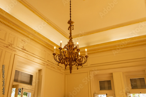 Decorative chandeliers in the interior of the palace photo