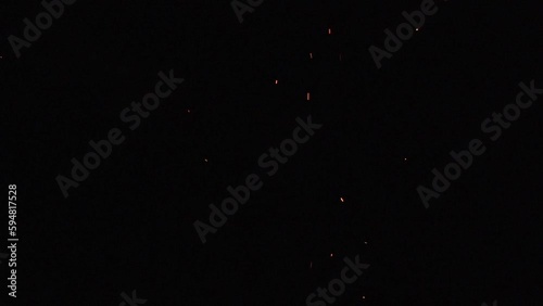 Fire embers in slow motion with black background