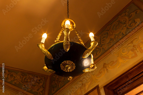 Decorative chandeliers in the interior of the palace