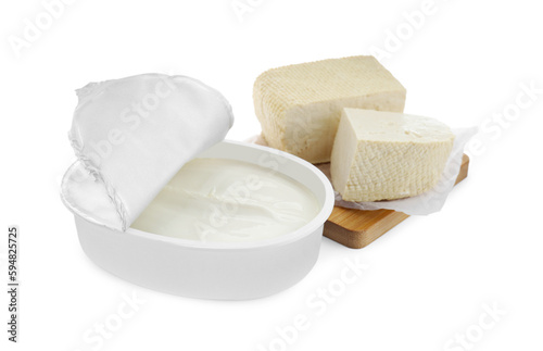 Tasty tofu and cream cheese on white background