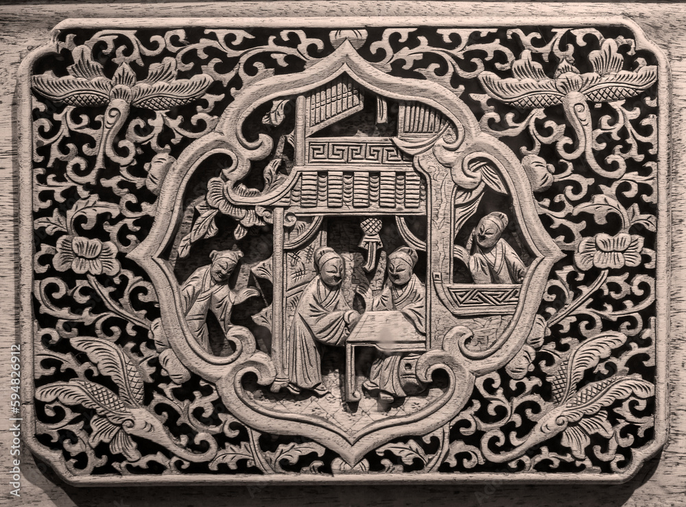 Exquisite carved designs on ancient Chinese wooden furniture