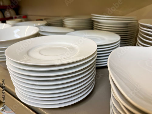 Stack of White Dinner Plates in Store