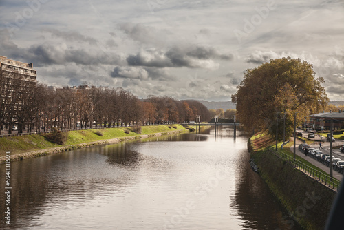 Panorama of the Meuse river in Liege, Belgium, with a focus on Pont de Belle ile, in Vennes district. Liege is one of the main cities of Wallonia, and meuse is one of the main rivers of the country. photo