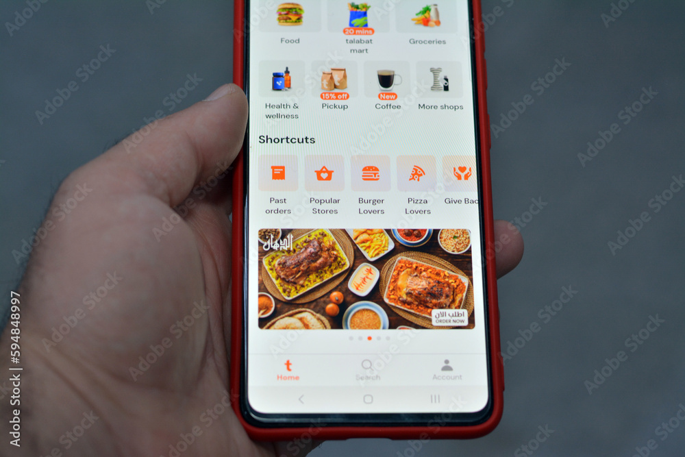 Cairo, Egypt, April 8 2023 Talabat mart application, online food ordering company founded in