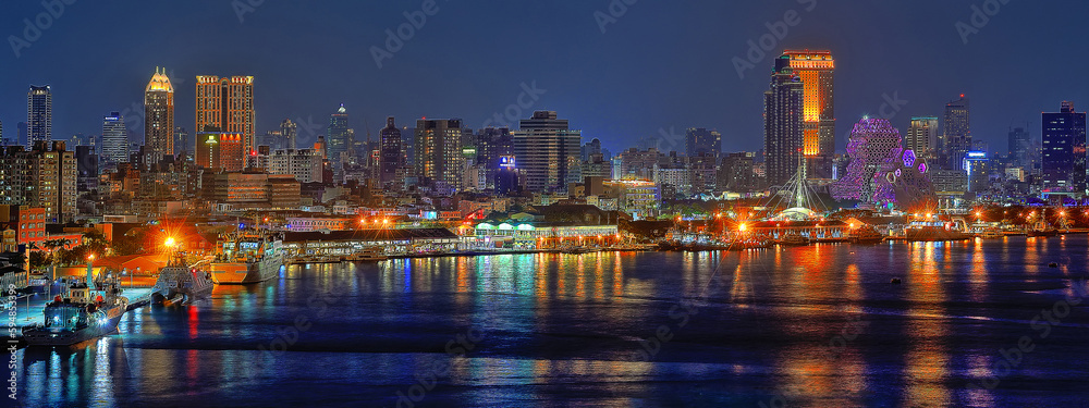 The vast and romantic night view of Kaohsiung Harbor,blue sky,broad sea dock,pier.Kaohsiung,Taiwan.for branding,calender,postcard,screensave,wallpaper,poster,banner,cover,website.High quality photo