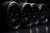 Close up of five wheels against black