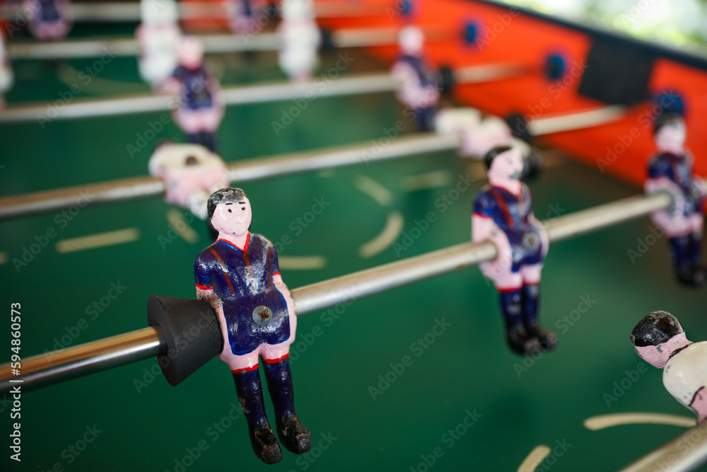 A foosball table is a recreational game symbolizing entertainment, skill, and socializing. It represents teamwork, competition, and the joy of play, and is often associated with bar and culture A foosball table is a recreational game symbolizing entertainment, skill, and socializing. It represents teamwork, competition, and the joy of play, and is often associated with bar and culture