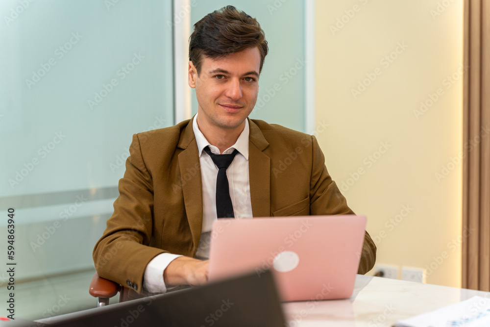 Team work. Businesswoman and man working and having a discussion in the meeting room Team work. Businesswoman and man working and having a discussion in the meeting room