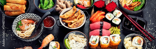 Obraz na plátně Traditional Japanese food dishes on black background