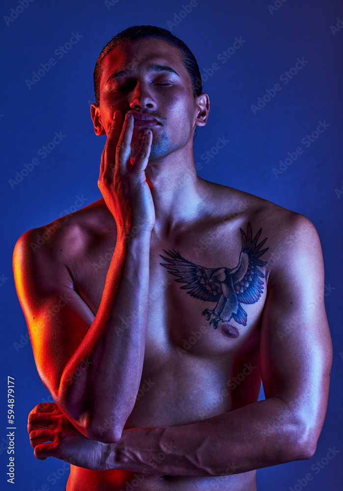 Sexy, beauty and man in dark light with chest tattoo as body art and model isolated