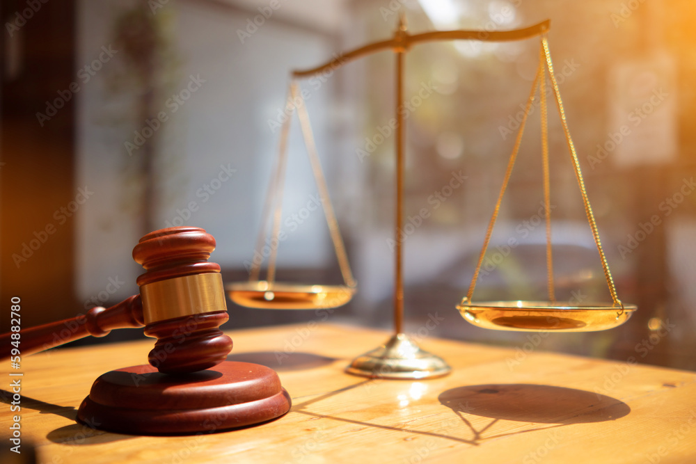 wooden judge gavel on table as symbol of justice for use in legal cases judicial system and civil rights and social justice concept with judge. concept of legislation to judge lawsuits with justice. wooden judge gavel on table as symbol of justice for use in legal cases judicial system and civil rights and social justice concept with judge. concept of legislation to judge lawsuits with justice.