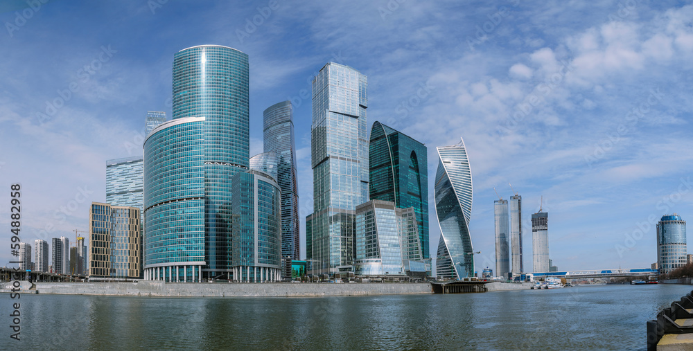 Panorama of Skyscrapers of Moscow City district in sunny day. Moscow. Russia