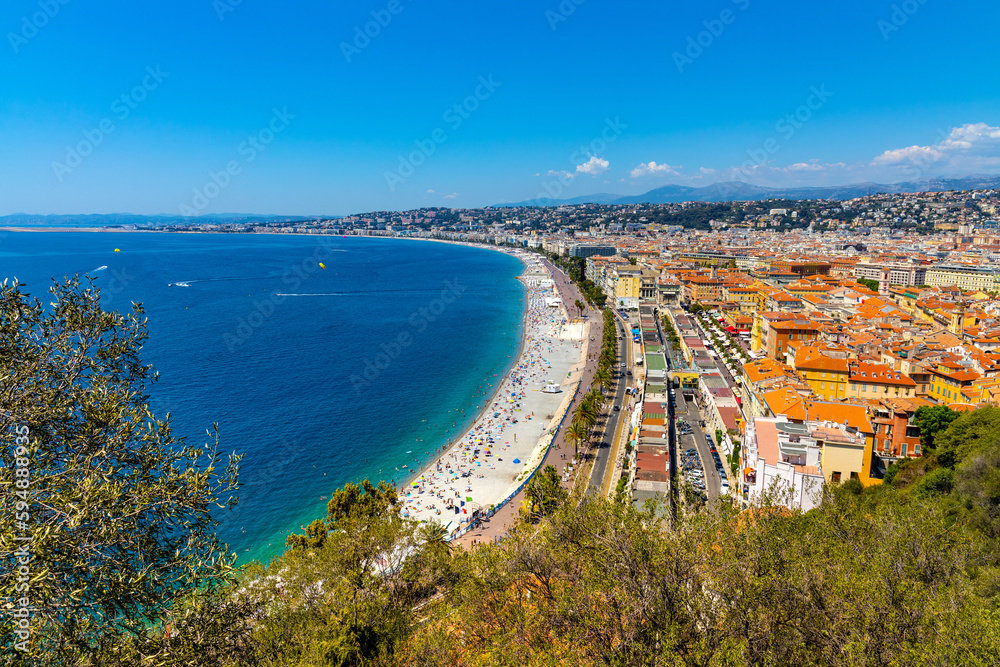 Nice panorama with Vieille Ville old town district, Promenade des Anglais boulevard and beach at French Riviera of Mediterranean Sea in France - obrazy, fototapety, plakaty 