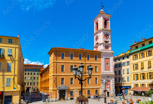 Palais Rusca Palace and Tour de l'Horloge clock tower at Place du Palais de Justice Palace square in historic Vieux Vieille Ville old town of Nice in France photo