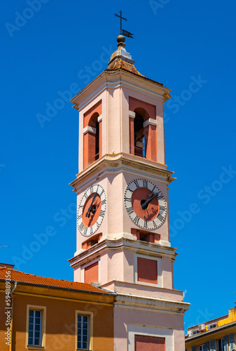 Tour de l'Horloge clock tower over Palais Rusca Palace at Place du Palais de Justice Palace square in historic Vieux Vieille Ville old town of Nice in France photo