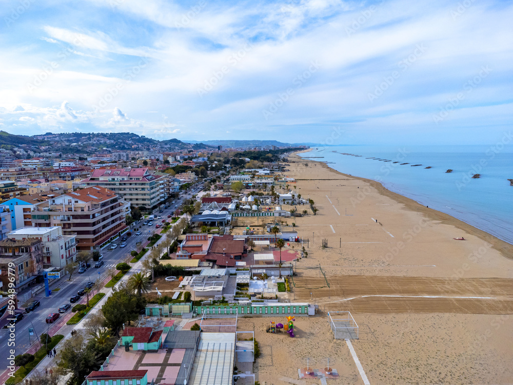 Aerial view landscape Italy Pescara, coast , beach, sea, promenade, buildings and apartments.