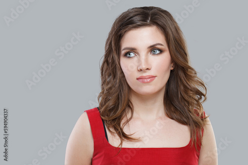 Attractive fashionable model woman with makeup and trendy hairstyle on white background