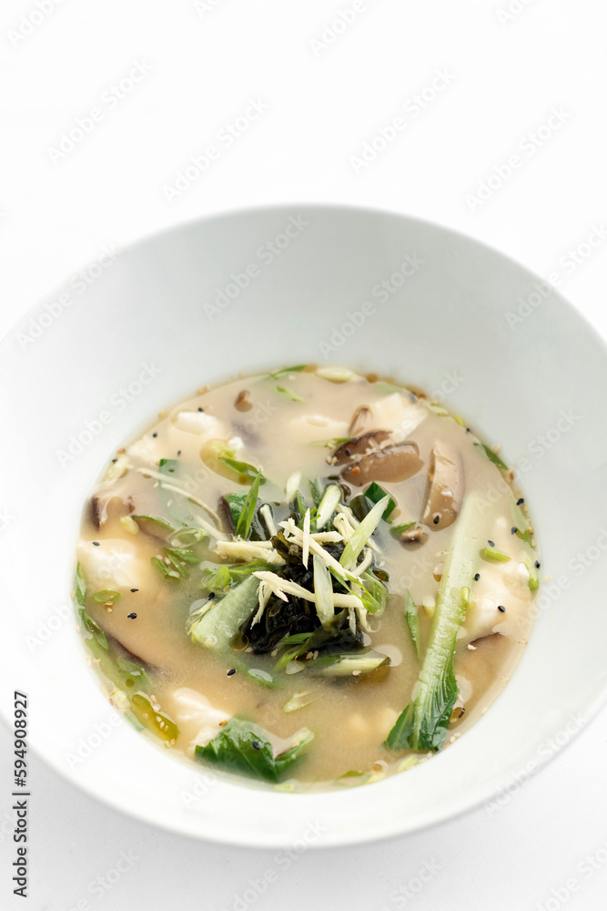 japanese miso soup with tofu, shiitake mushrooms, bok choy and seaweed japanese miso soup with tofu, shiitake mushrooms, bok choy and seaweed