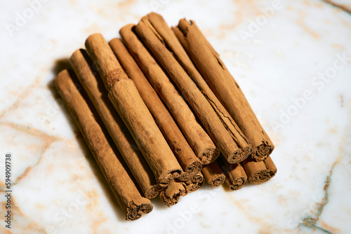 Close up still life brown Ceylon cinnamon sticks
 photo