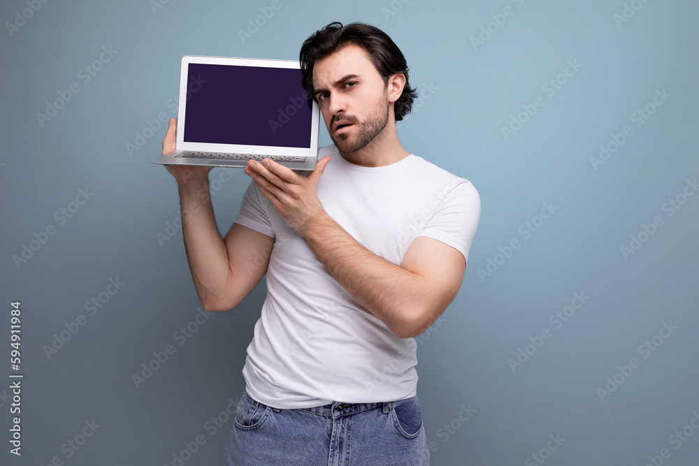 male hardware store manager demonstrating laptop screen mockup male hardware store manager demonstrating laptop screen mockup
