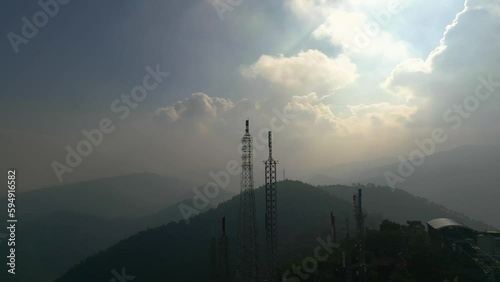 Footage 4k B-roll Aerial drone view of tower antennas Telecommunication cell phone, radio transmitters of cellular 5g 4g mobile and smartphones. High quality 4k footage