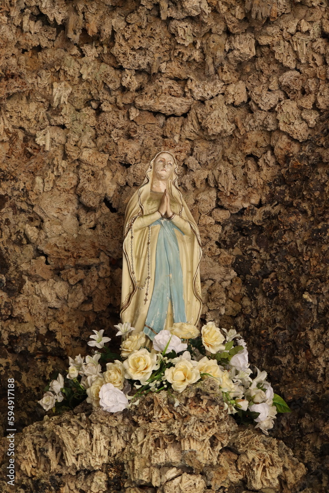 Statue of Lady Mary in the cave Statue of Lady Mary in the cave