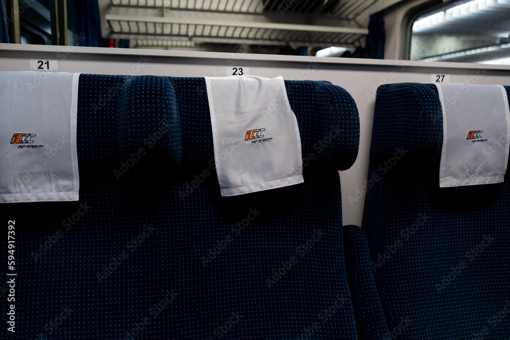 PKP Intercity logo sign on the seat backrest, inside passenger train ...