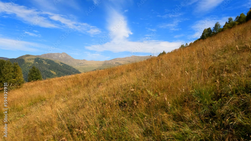 mountain landscape, view of Arkhyz mountains at autumn with blue sky - photo of nature