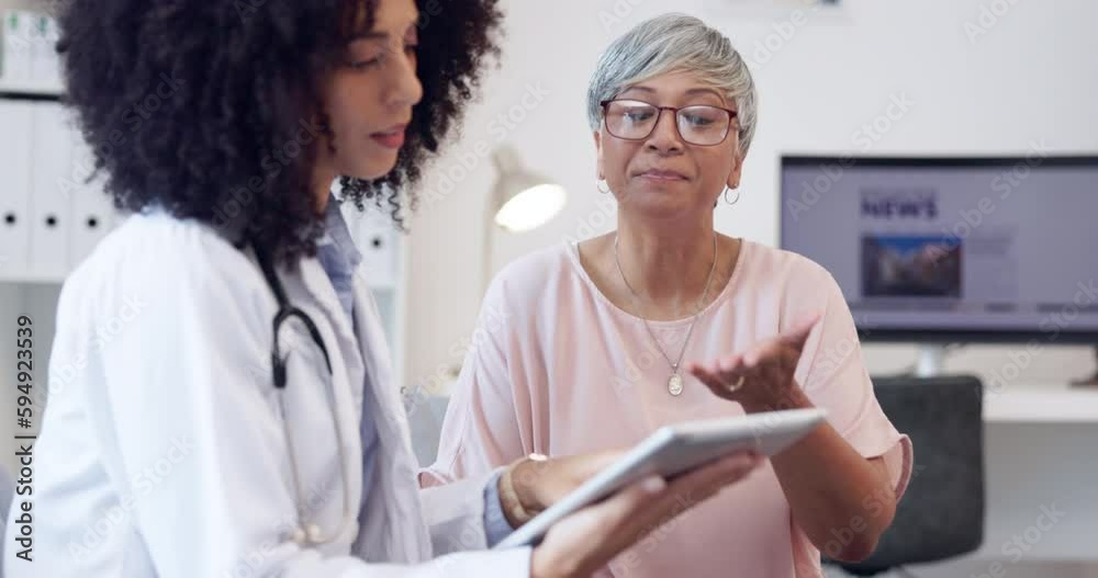 Healthcare, tablet and patient talking to doctor in a hospital about heart health. Old person and medical professional with a mobile app for results, consultation or cardiology report for wellness Healthcare, tablet and patient talking to doctor in a hospital about heart health. Old person and medical professional with a mobile app for results, consultation or cardiology report for wellness
