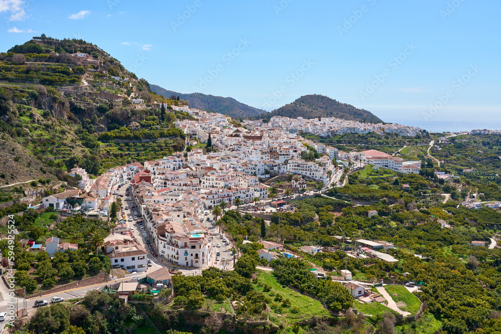 aerial view of picturesque white village of Frigiliana, Andalusia, Spain