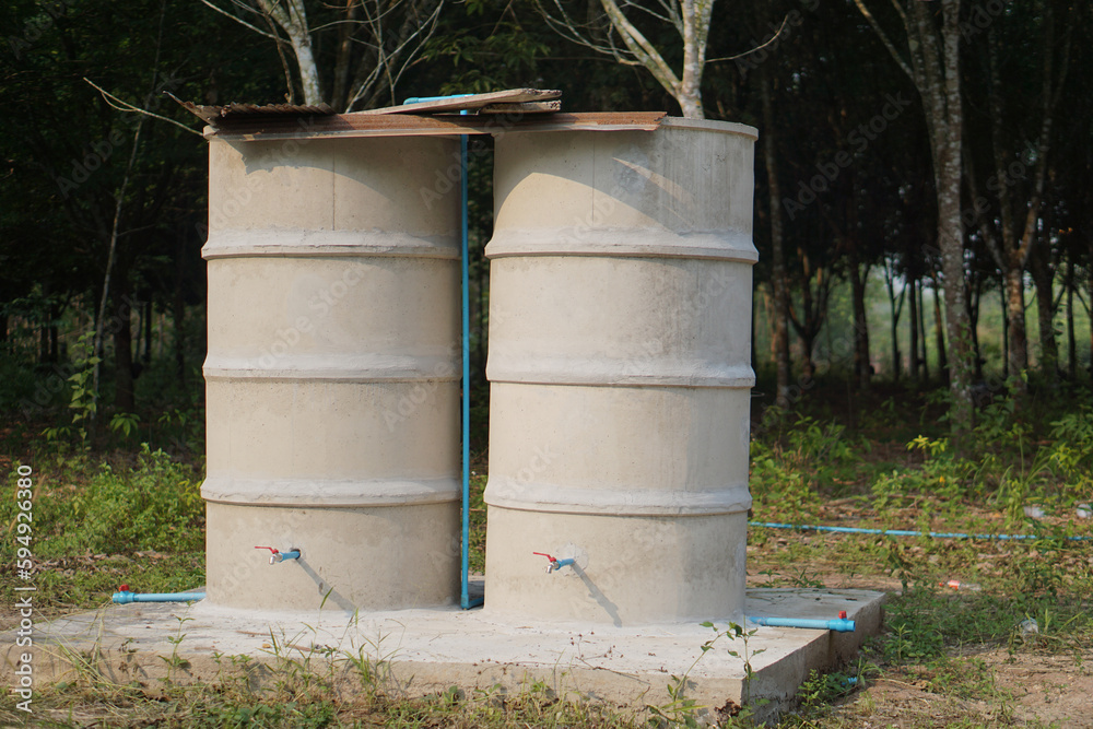 Cement water tanks at garden for keeping water that local gardeners in