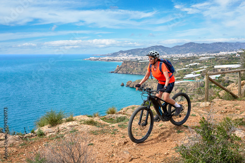 nice senior woman cycling w...
