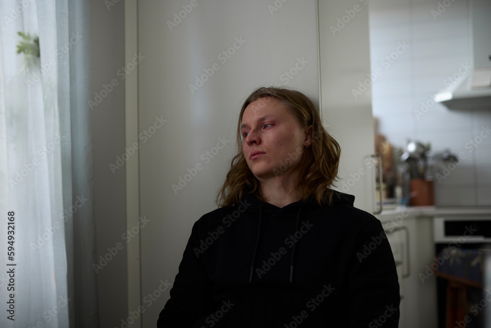 Sad man sitting at table