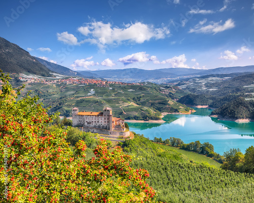 Fabulous  View of the Cles Castel, the Santa Giustina Lake and lots of apple plantations. photo
