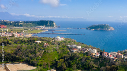 Aerial view of the island of Nisida. It is located in Naples, Italy. Nisida is a volcanic islet of the Flegrean Islands archipelago. It is connected to the city by a long pier.