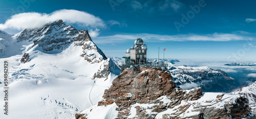 Aerial panorama view of the Sphinx Observatory on Jungfraujoch - Top of Europe, one of the highest observatories in the world located at the Jungfrau railway station, Bernese Oberland, Switzerland.