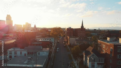 Sunset lens flare over downtown street in Syracuse New York