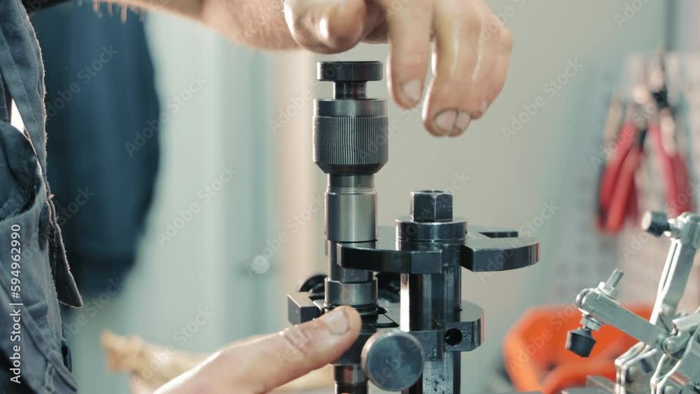 Repair of car injectors close-up. Disassembly of the nozzle and replacement of spare parts. Repair of car injectors close-up. Disassembly of the nozzle and replacement of spare parts.