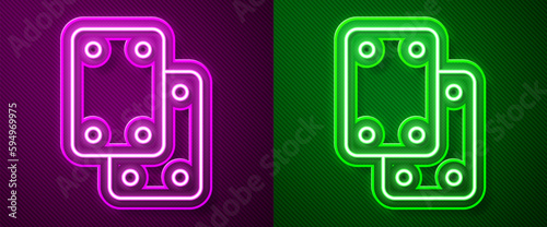 Glowing neon line Knee pads icon isolated on purple and green background. Extreme sport. Skateboarding, bicycle, roller skating protective gear. Vector