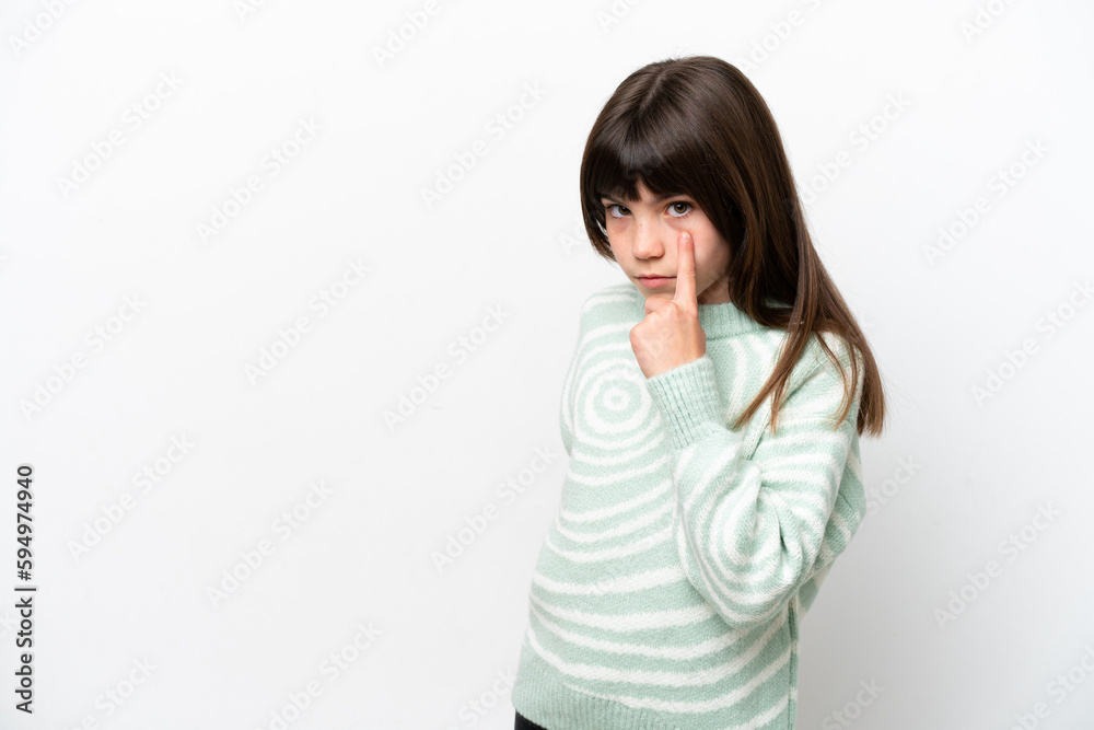 Little caucasian girl isolated on white background showing something Little caucasian girl isolated on white background showing something