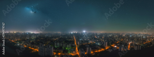 Meteor falling. Panorama of the city and the starry sky. Close-up. Generated AI