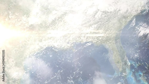 Earth zoom in from outer space to city. Zooming on Gulfport, Mississippi, USA. The animation continues by zoom out through clouds and atmosphere into space. Images from NASA