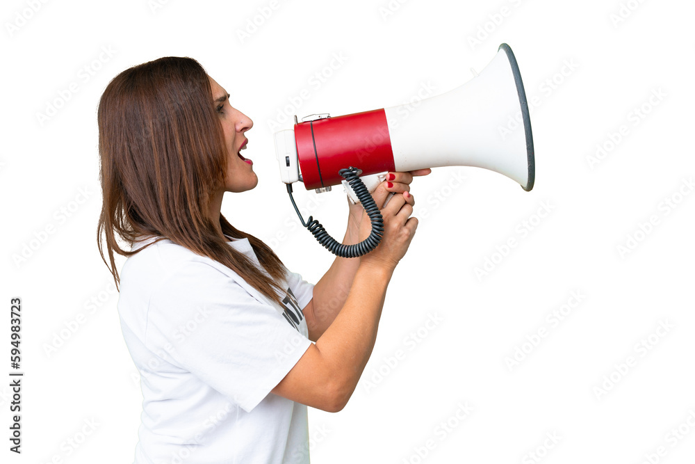 Middle age volunteer woman over isolated chroma key background shouting through a megaphone Middle age volunteer woman over isolated chroma key background shouting through a megaphone